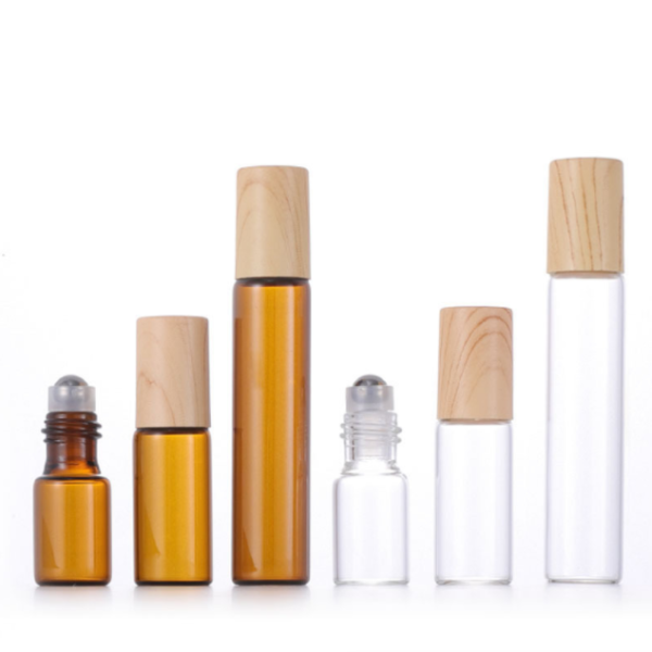 Klaasrullviaalide hulgimüük Amber Clear 1ml 2ml 3ml 5ml Roll On Bottle Klaasrullviaalid plastikust bambuskorgiga